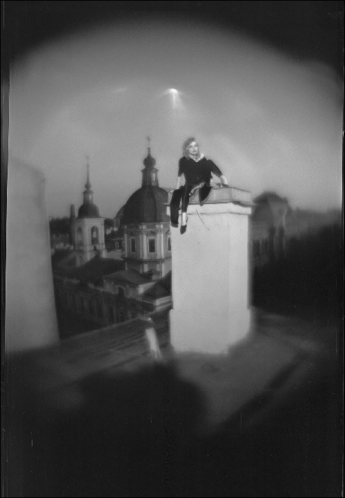 Кита на трубе.